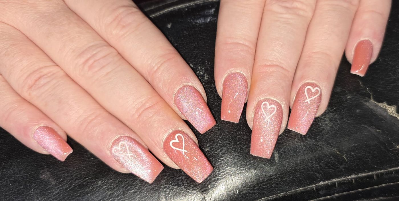 Nude BIAB nails with small heart detail